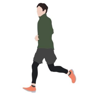 厚着をして走る男性