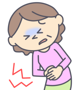 お腹を抱える人