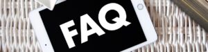画面に「FAQ」と書かれたスマートフォン