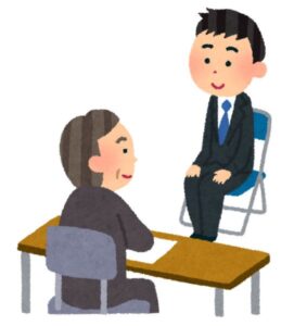 男性面接官と面接を受ける男性