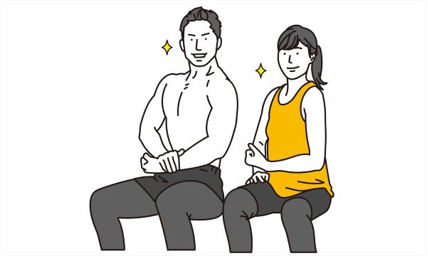 マッスルポーズをとる男性と女性