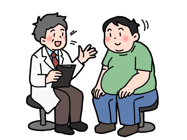 医師の話をうなづきながら聴く肥満男性